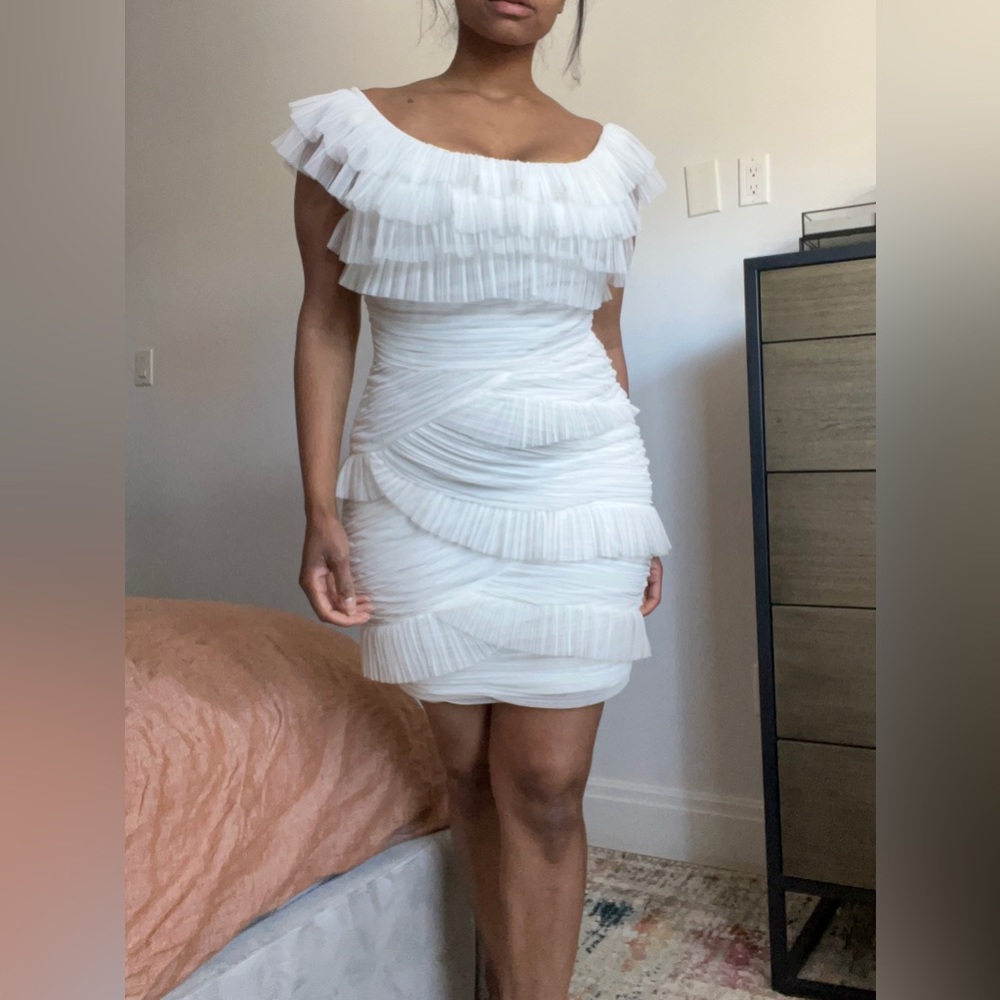 BCBG Maxazria white cap shoulder mini dress with tulle tier design